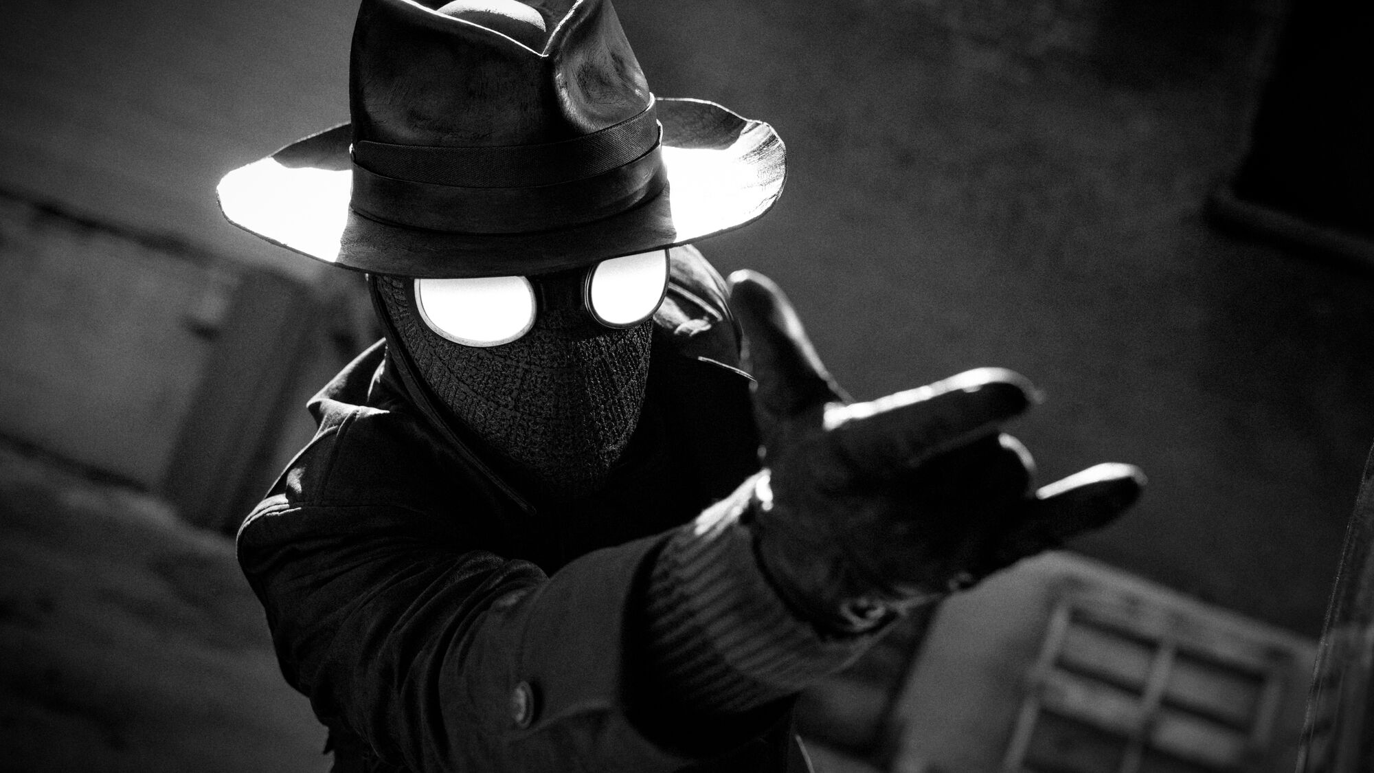 A still image from the black and white animated series Spider-Noir showing the main character in a fedora about to shoot a web.