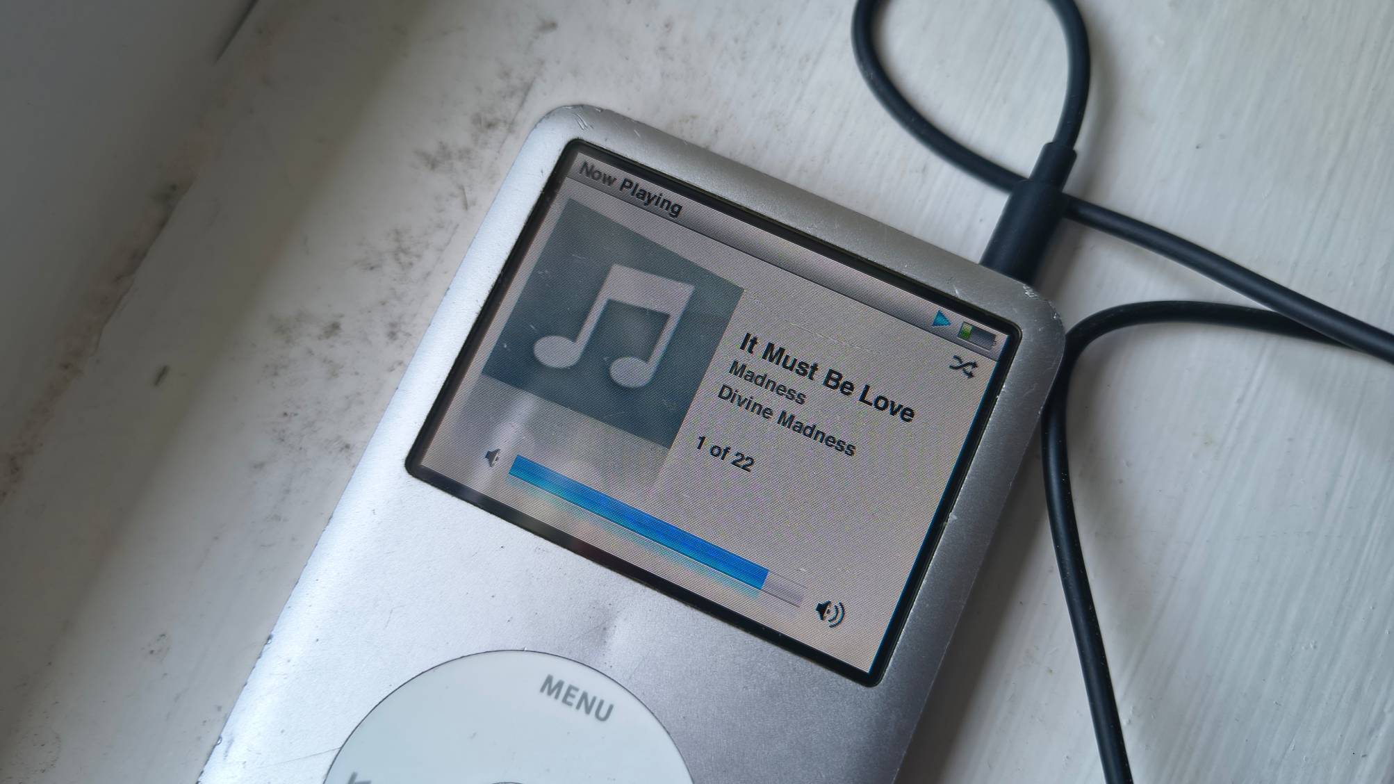 The iPod Classic on a window sill.