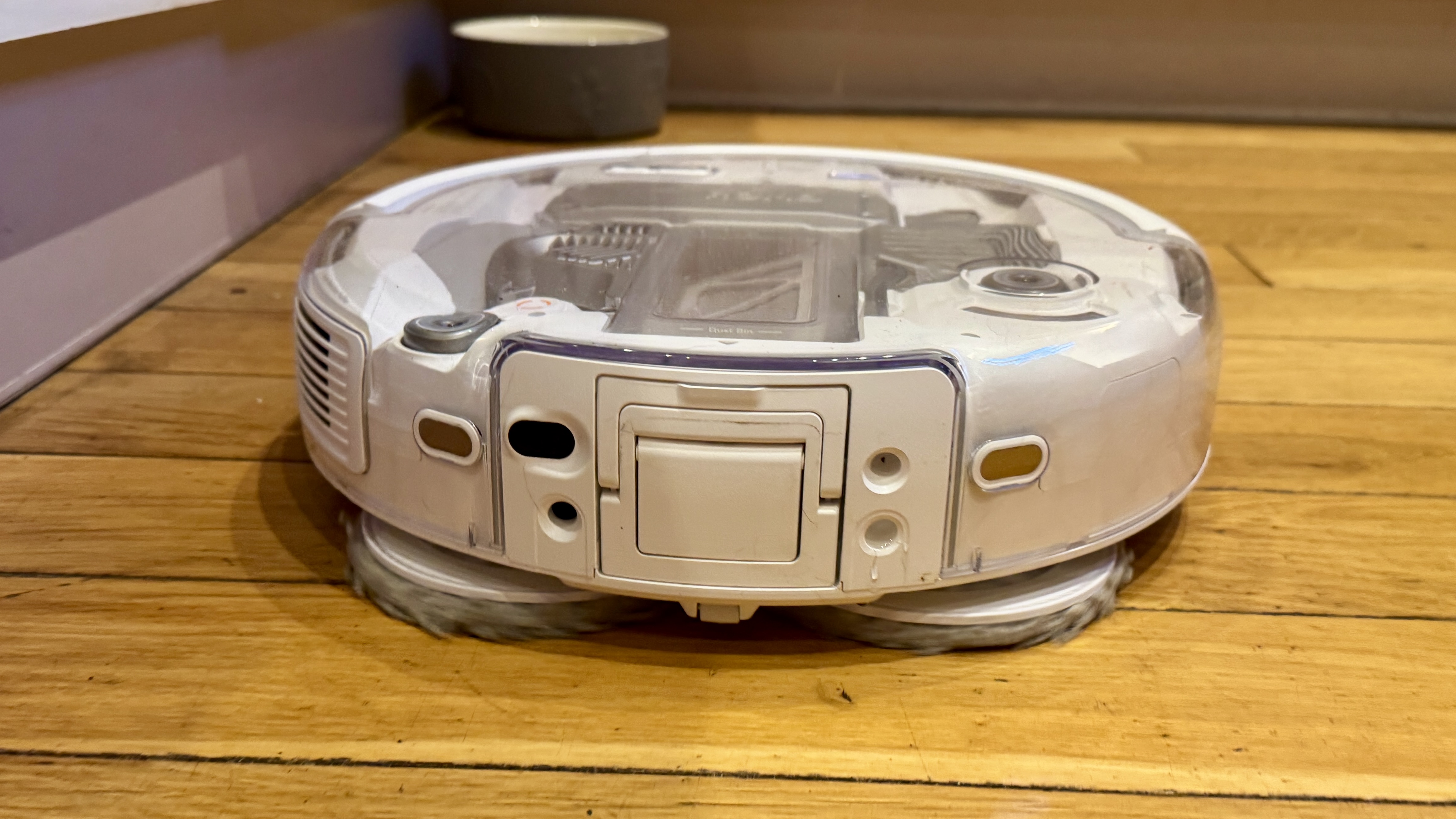 DJI Romo P robot vacuum cleaner mopping a hard floor