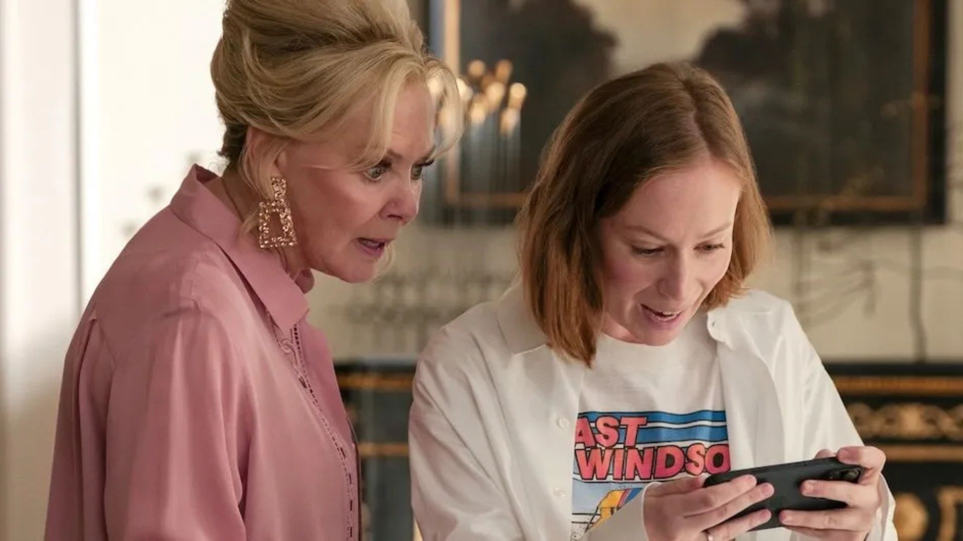 Deborah looks at Ava's phone in shock.