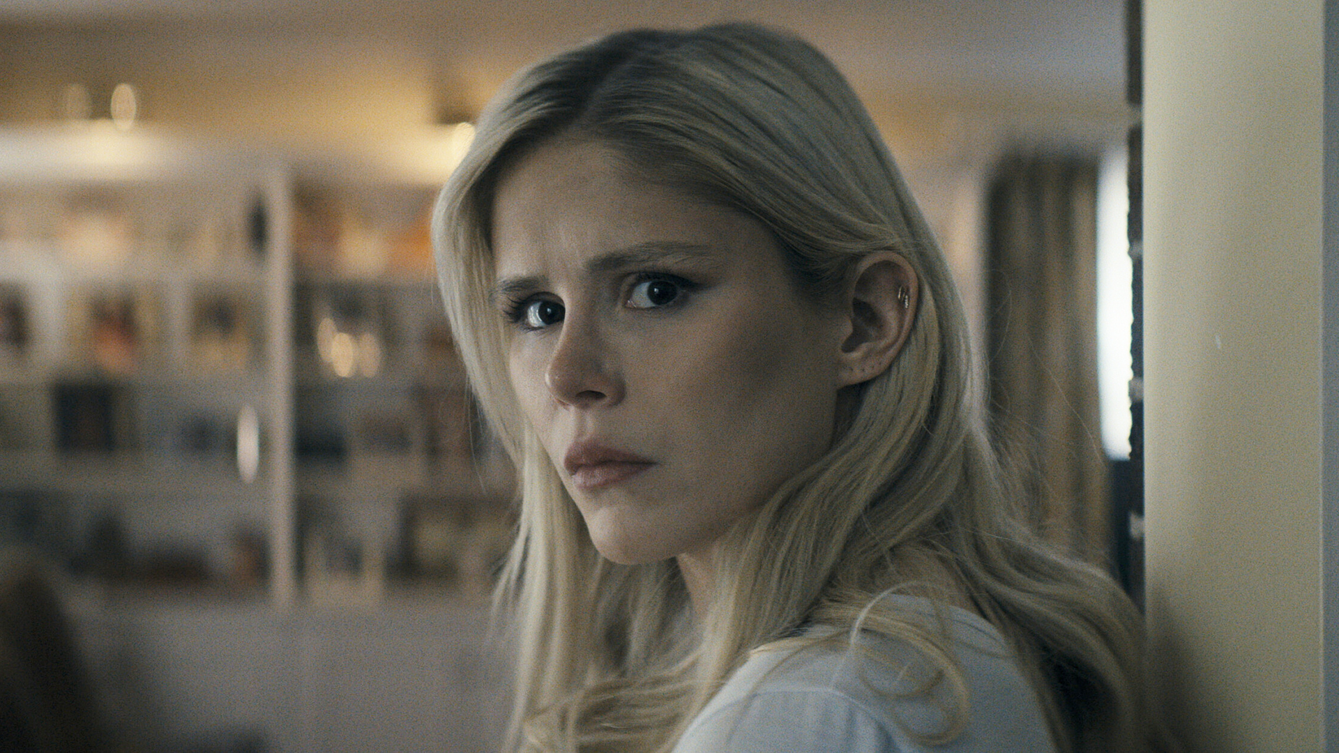 Starlight looking directly at the camera over her left shoulder in The Boys season 5 episode 4.