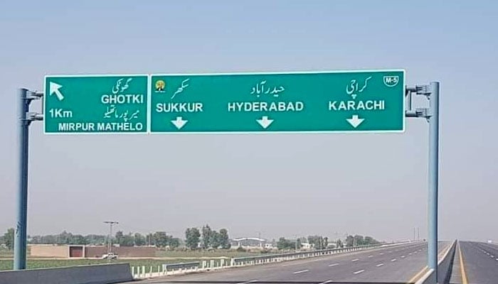 This undated image shows a traffic sign on the M5 motorway directing traffic towards Ghotki, Sukkur, Hyderabad and Karachi. — @desarrollopak