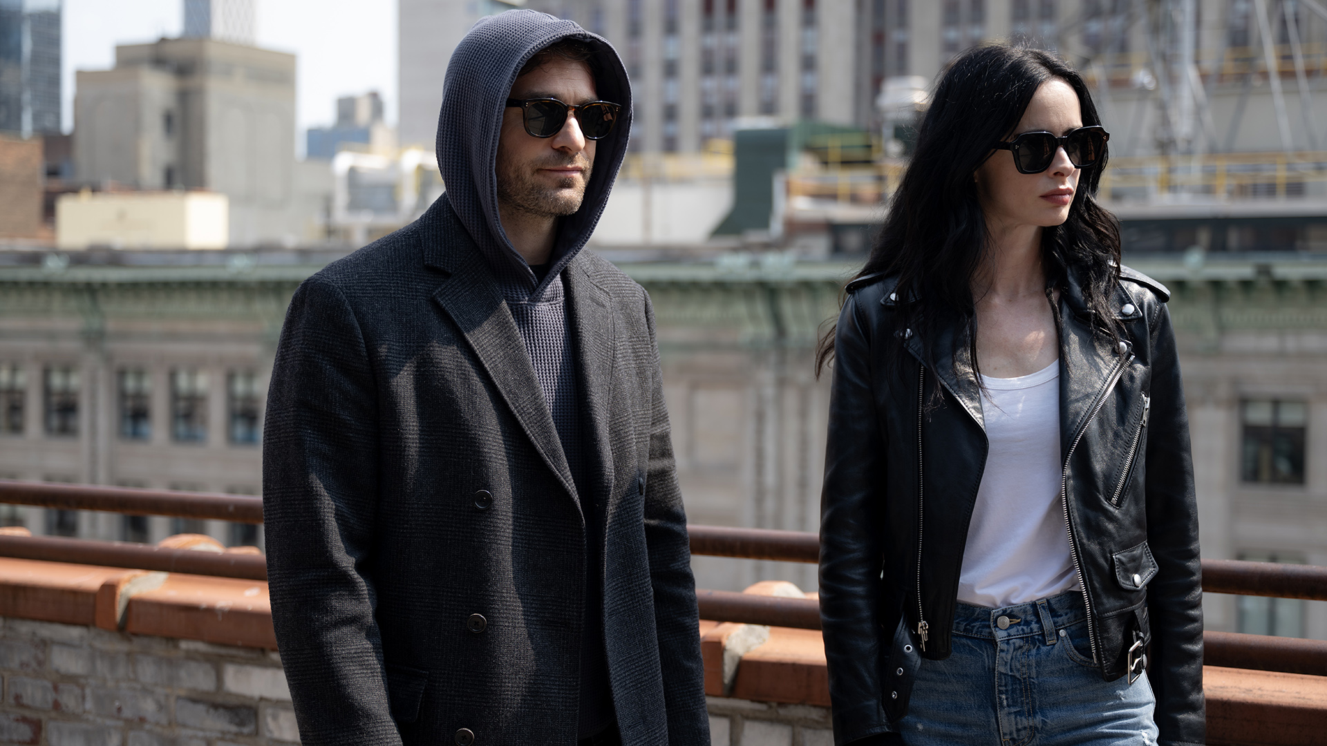 Matt hooded and wearing sunglasses with Jessica Jones wearing sunglasses in Daredevil: Born Again season 2, episode 7
