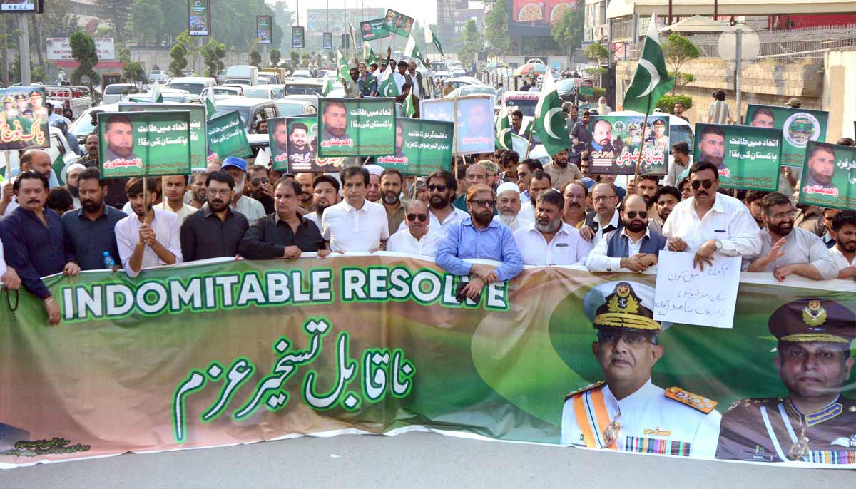 Traders hold a rally to mark the first anniversary of Marka-e-Haq on Mall Road. - Online