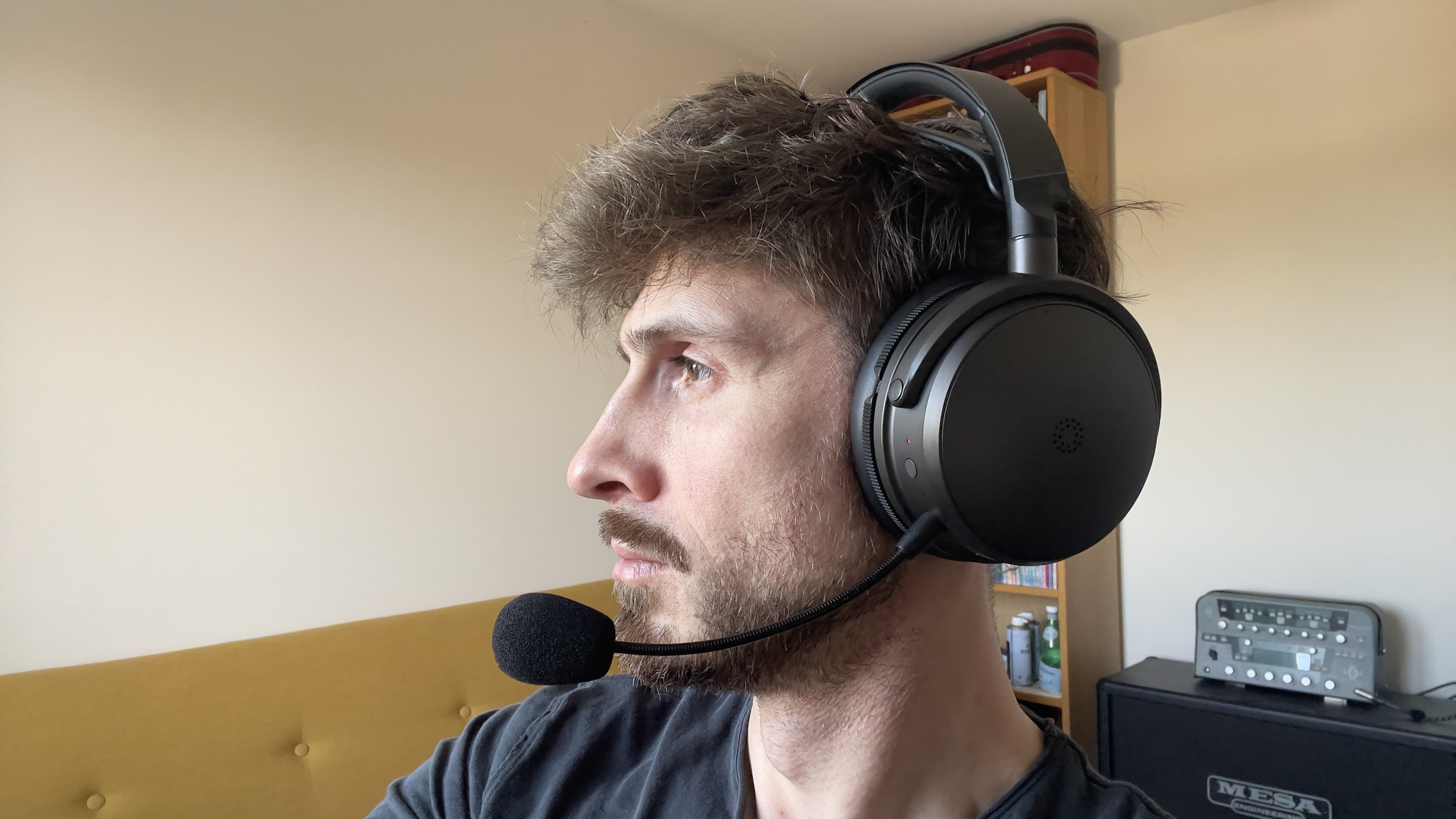 A man wearing headphones with a microphone.