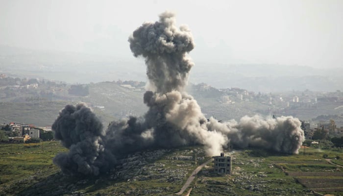 Smoke rises from the site of an Israeli airstrike that targeted the village of Deir El Zahrani, southern Lebanon, on May 13, 2026. – AFP
