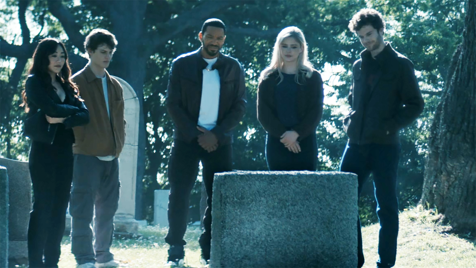 Kimiko, Ryan, Mother's Milk, Starlight and Hughie standing and looking at Butcher's grave in The Boys season 5 episode 8