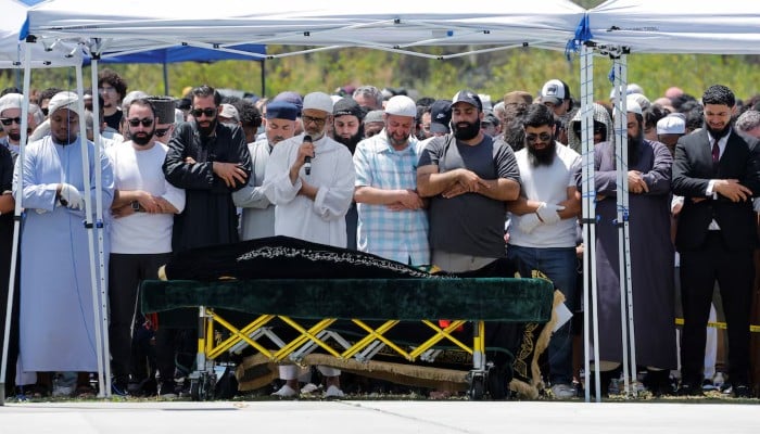 People attend a prayer service for victims of a shooting at the Islamic Center, in San Diego, California, U.S., on May 21, 2026. – Reuters