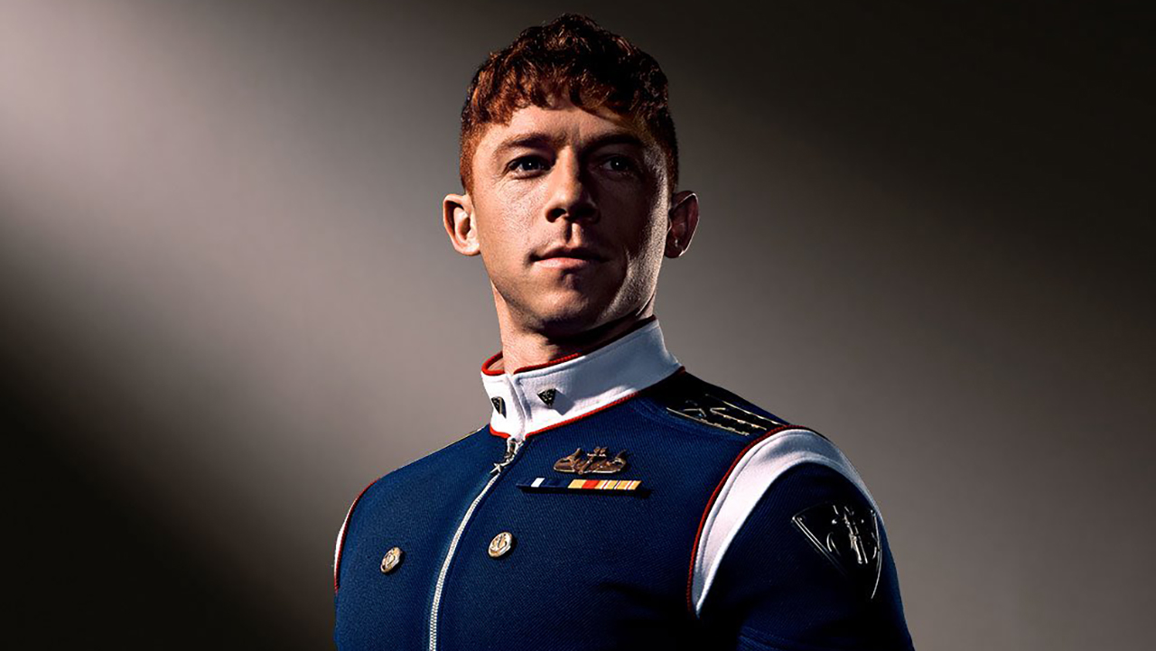 A press image of Torpedo smiling and looking at the camera in Vought Rising.