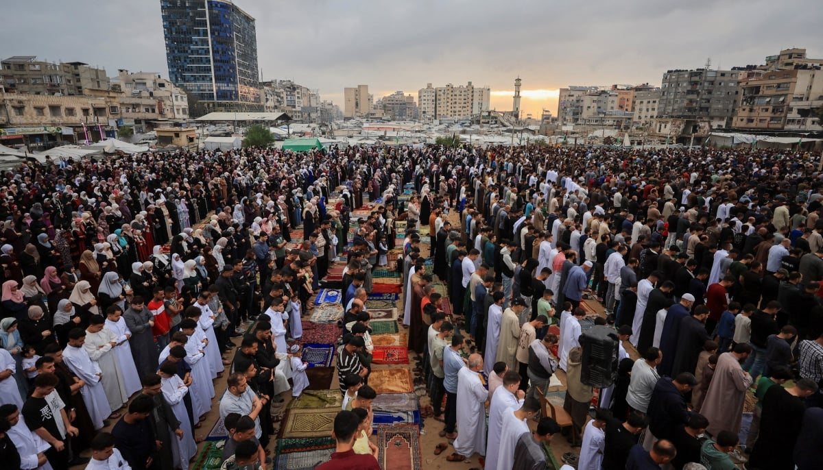 Palestinian Muslims attend the Eid ul Adha prayer, in Gaza City, on May 27, 2026. – Reuters