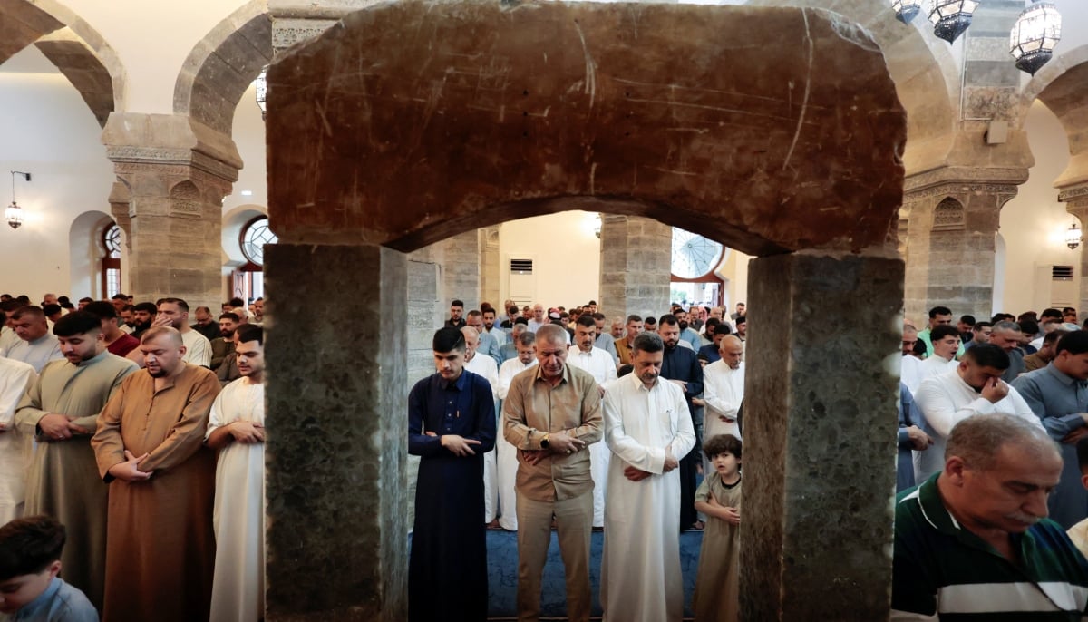 Muslim worshipers attend the Eid ul Adha prayer in Mosul, Iraq, on May 27, 2026. – Reuters