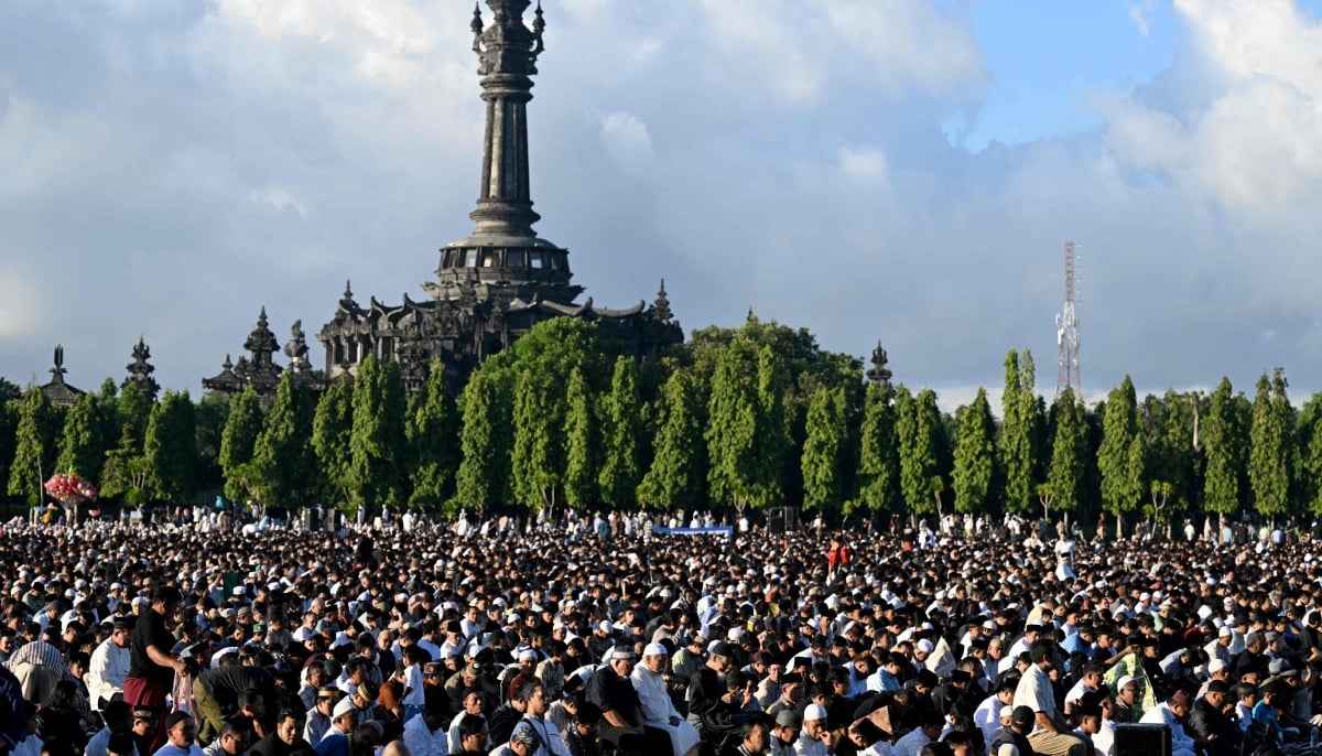 Muslim worshipers offer prayers for Eid ul Adha, or Feast of Sacrifice, in Denpasar, on the resort island of Bali, Indonesia, on May 27, 2026. — AFP