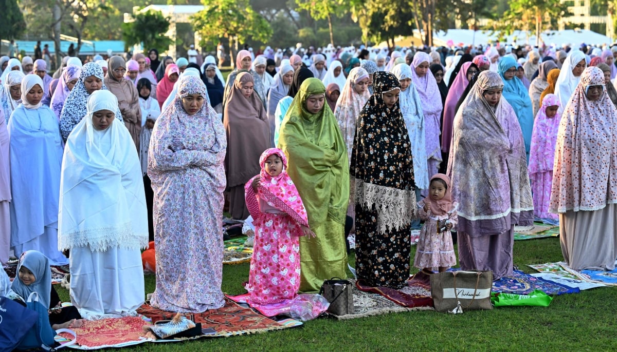 11. Muslim worshipers offer prayers for Eid ul Adha, or Feast of Sacrifice, in Denpasar, on the resort island of Bali, Indonesia, on May 27, 2026. — AFP