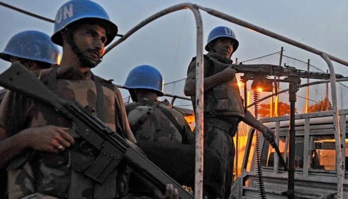 Pakistani UN peacekeepers patrol near the headquarters of the United Nations Force in Côte d'Ivoire (UNOCI) in Abidjan. — AFP/Archive