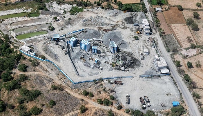 This aerial photograph taken on May 19, 2026 shows a stone crushing plant near a quarry in the Aravalli range in the city of Neem ka Thana in Rajasthan. — AFP