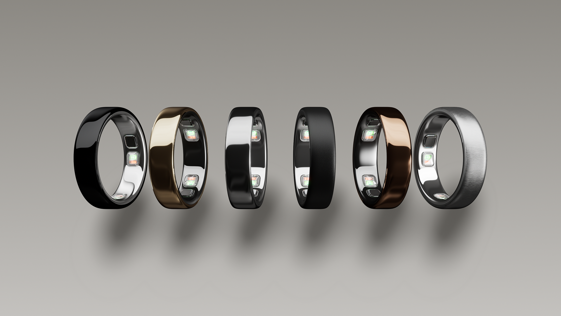Six Oura Ring 5 lined up next to each other showing the difference in finishes