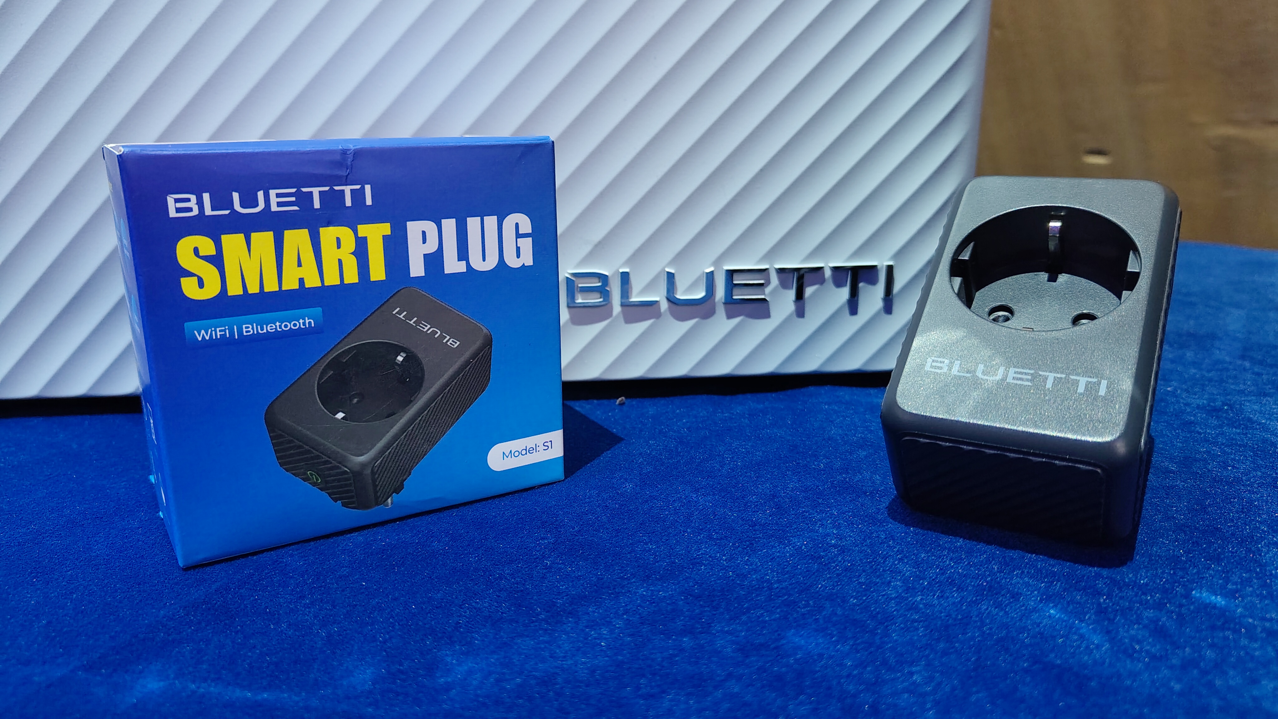 Bluetti Balco accessories, the S Meter and the S1 Smart Plug on display at an event in Paris