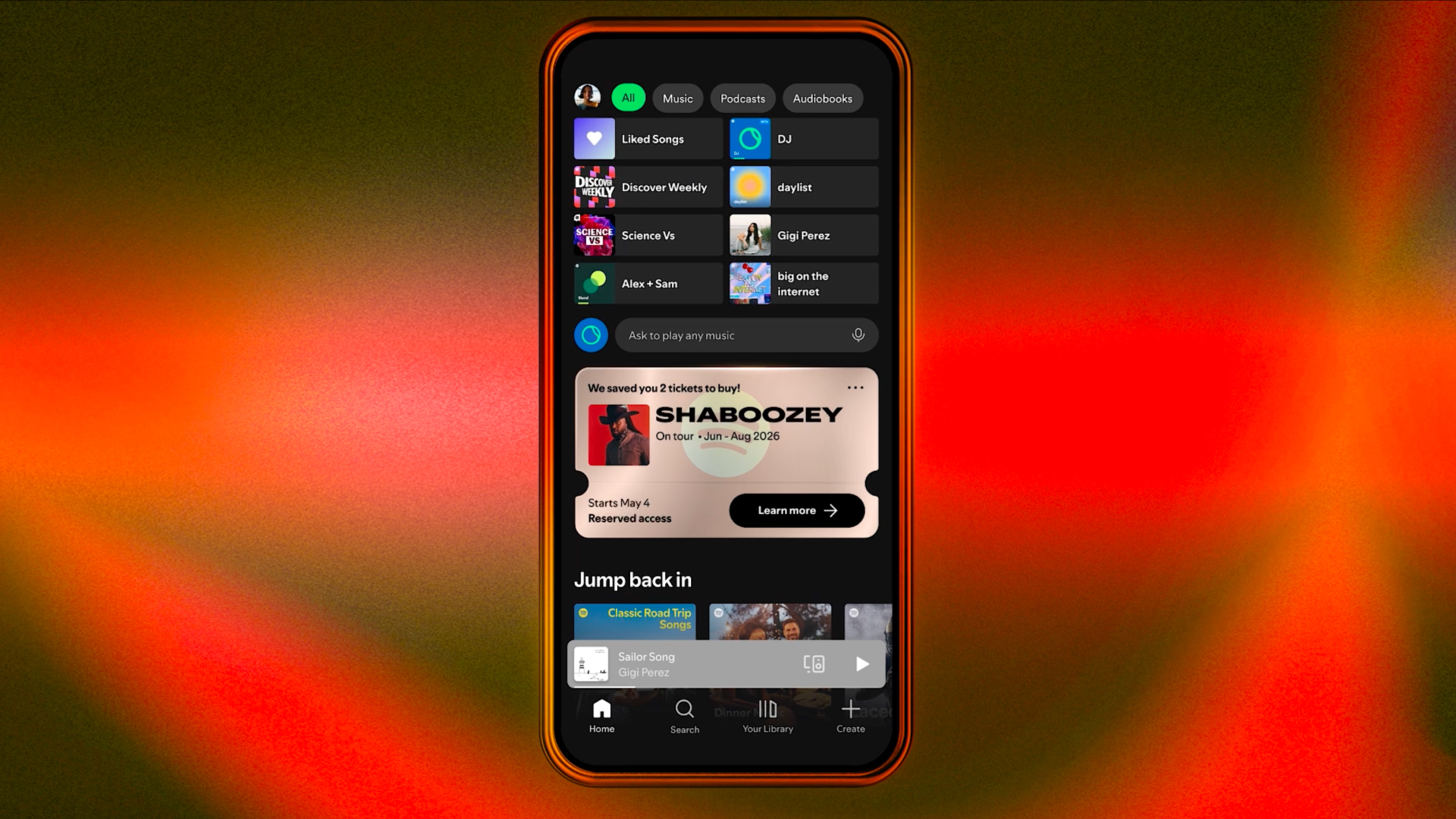 A smartphone showing the Spotify home page with a pop-up window showing reserved concert tickets.