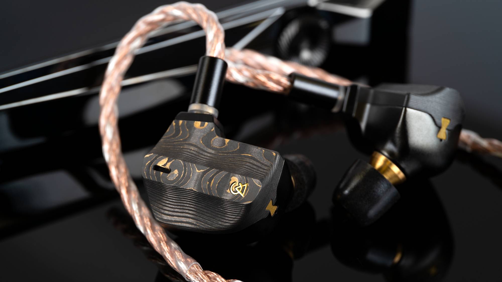 The Campfire Audio Chimera together with a digital audio player.