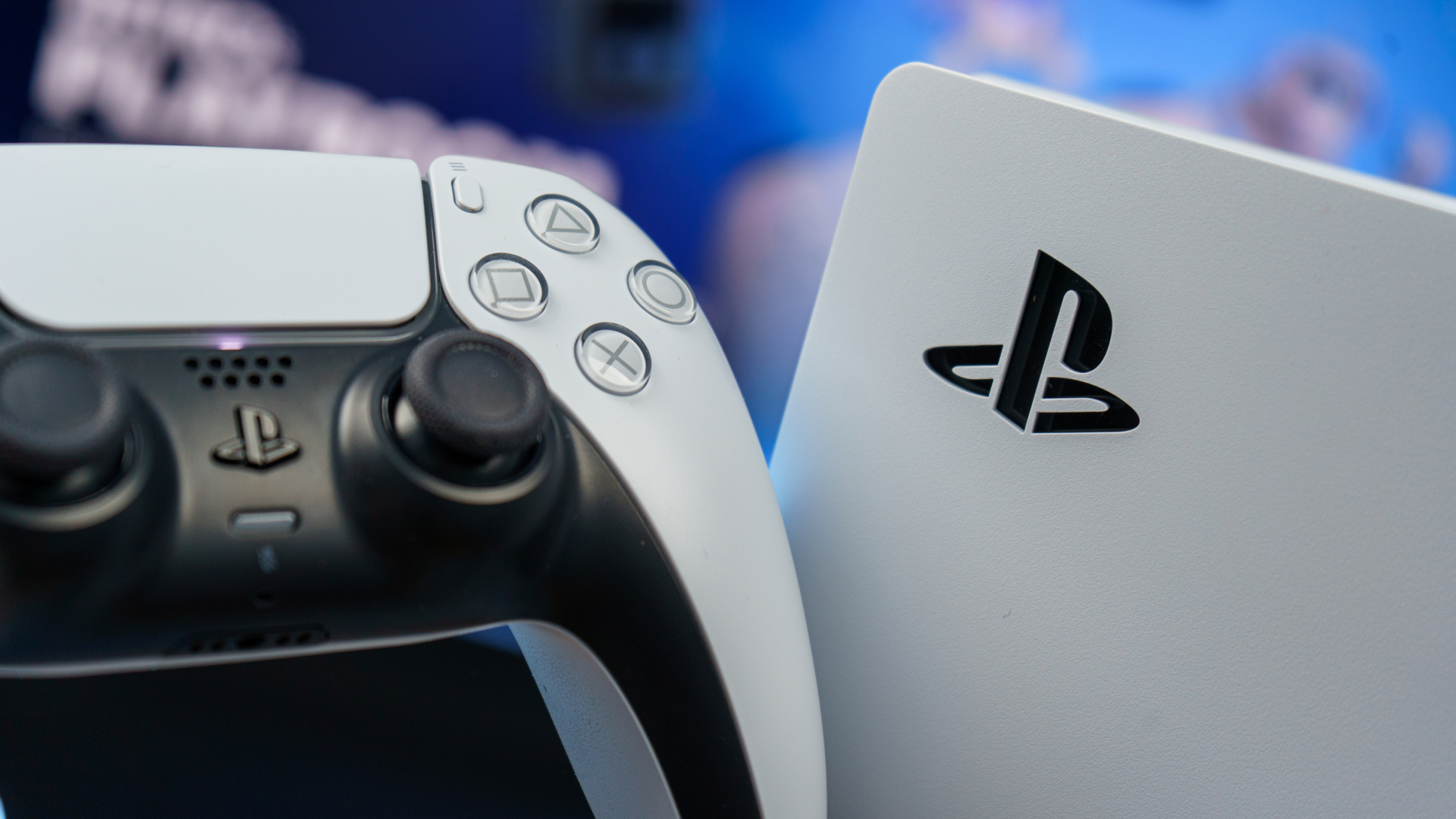 Close-up of PS5 console and DualSense controller