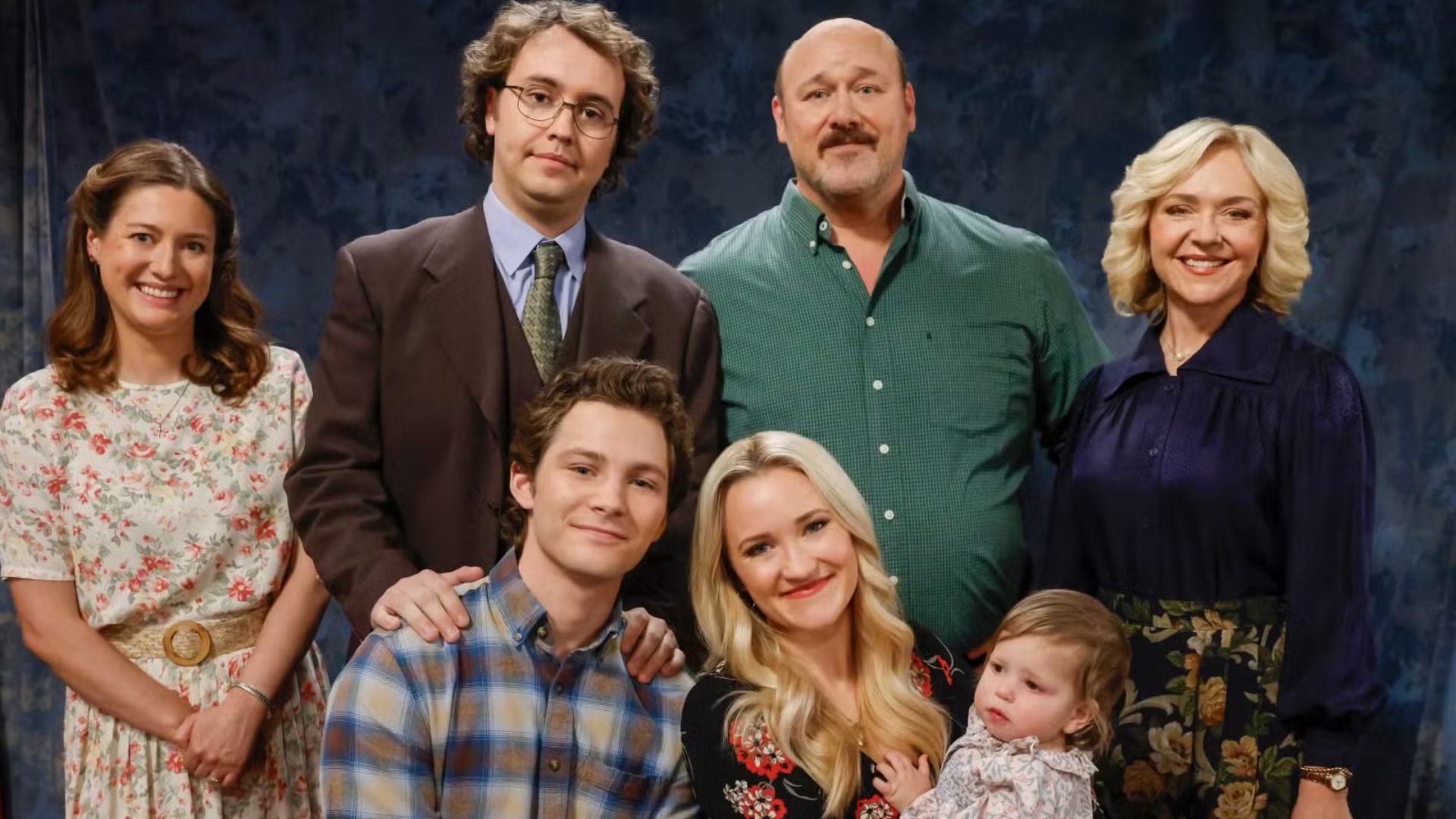 Georgie, Mandy and their family pose for a portrait