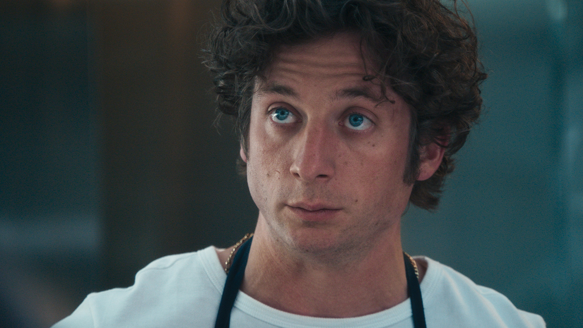 A close-up of a serious looking Carmy in season 4 of The Bear