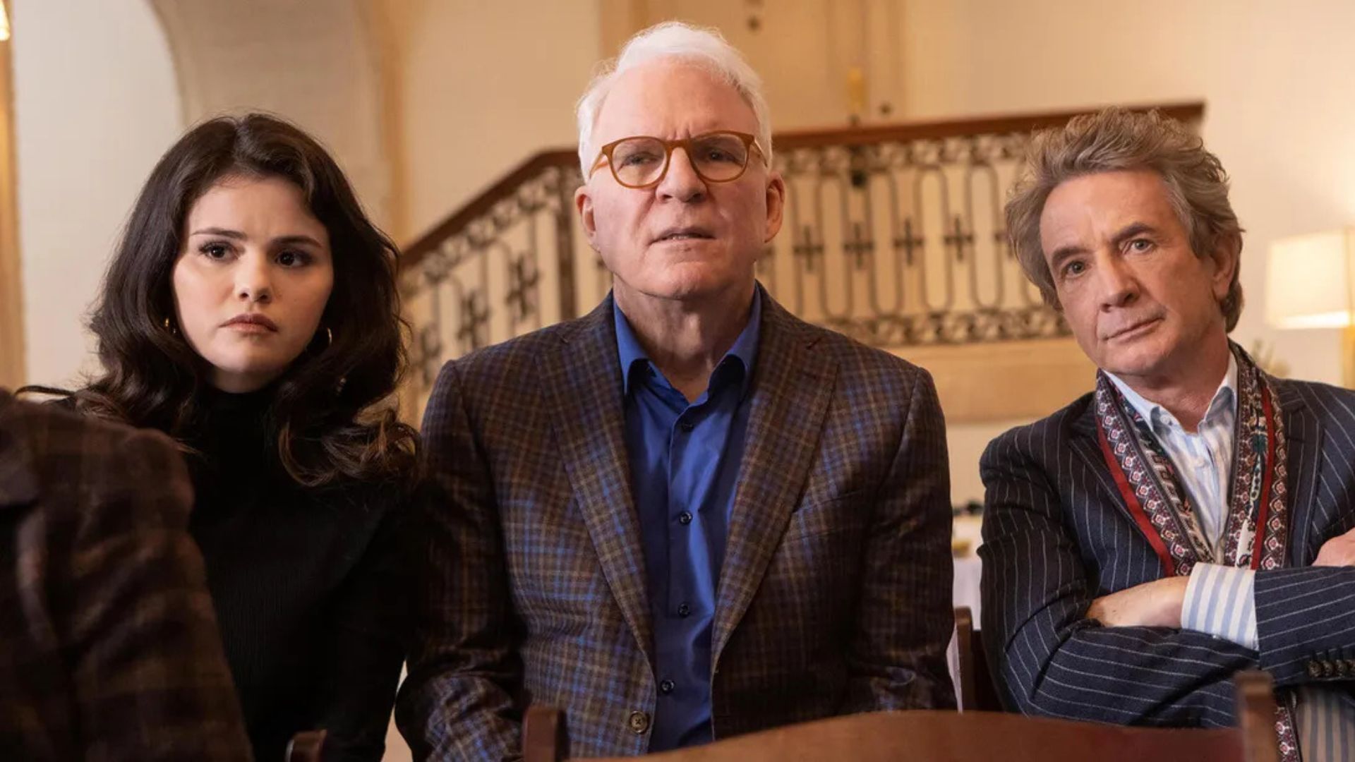 Selena Gomez, Steve Martin and Martin Short stand in line and look worried