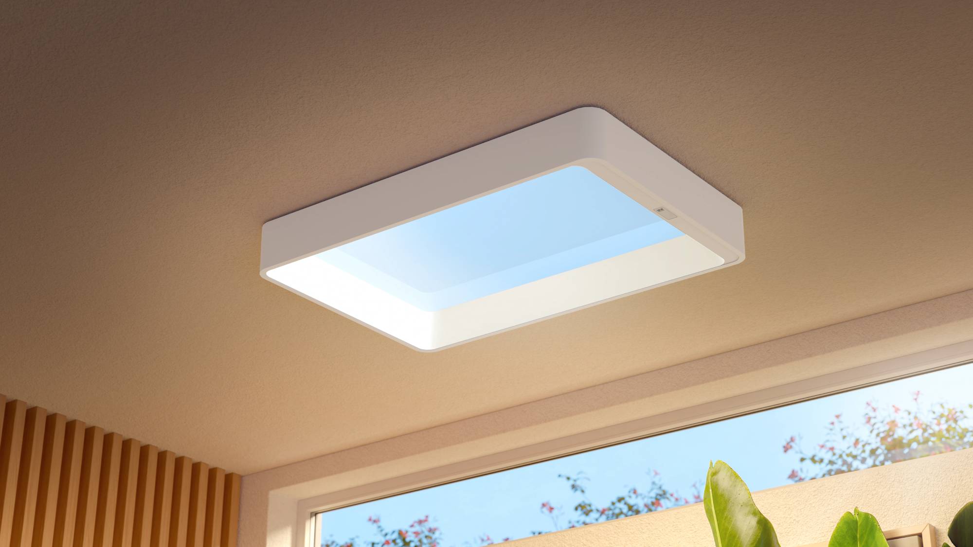 The Philips Skylight fixed to the roof of a house imitating a blue sky