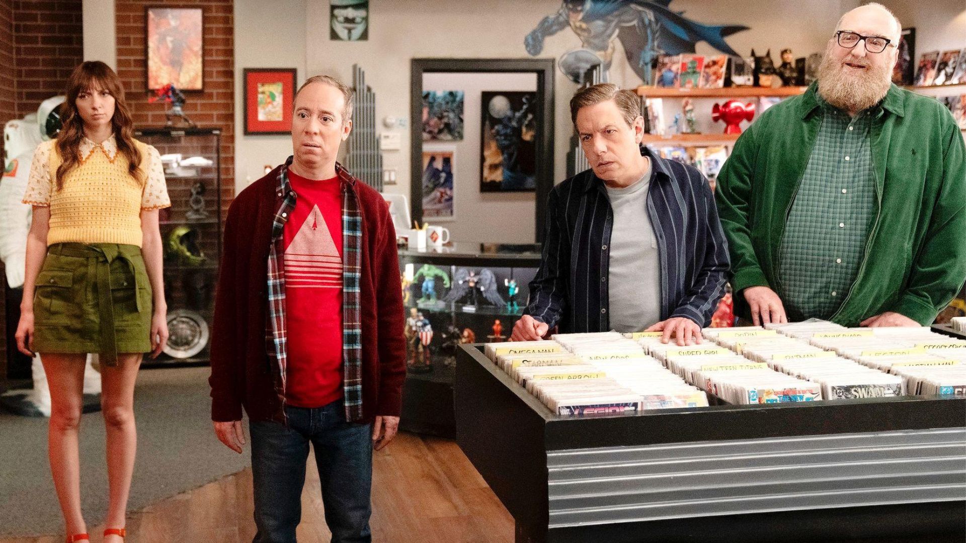 The gang looks at something off screen.