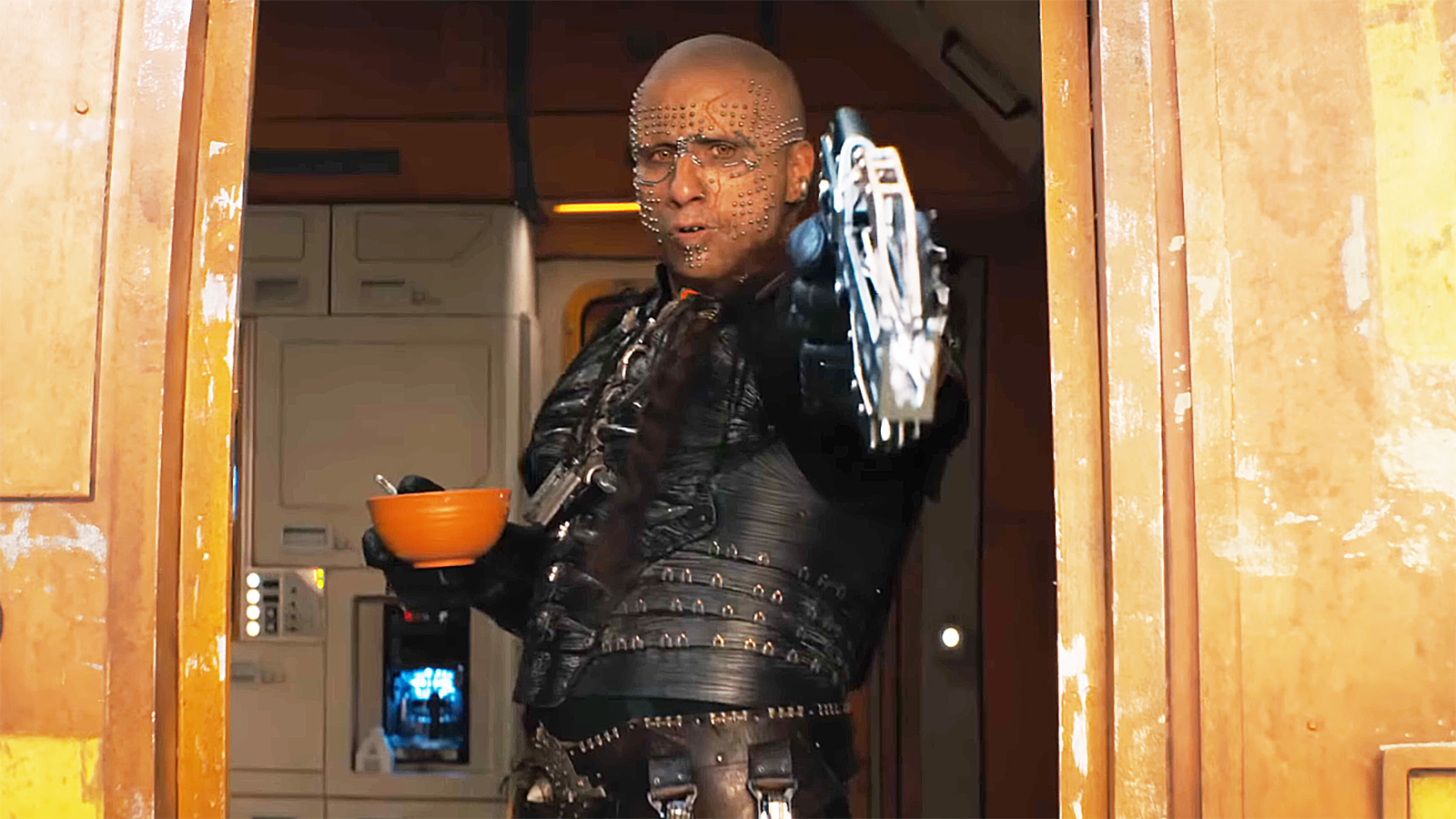 Krem fires a bolt of lightning from his crossbow while standing on a spaceship in Supergirl