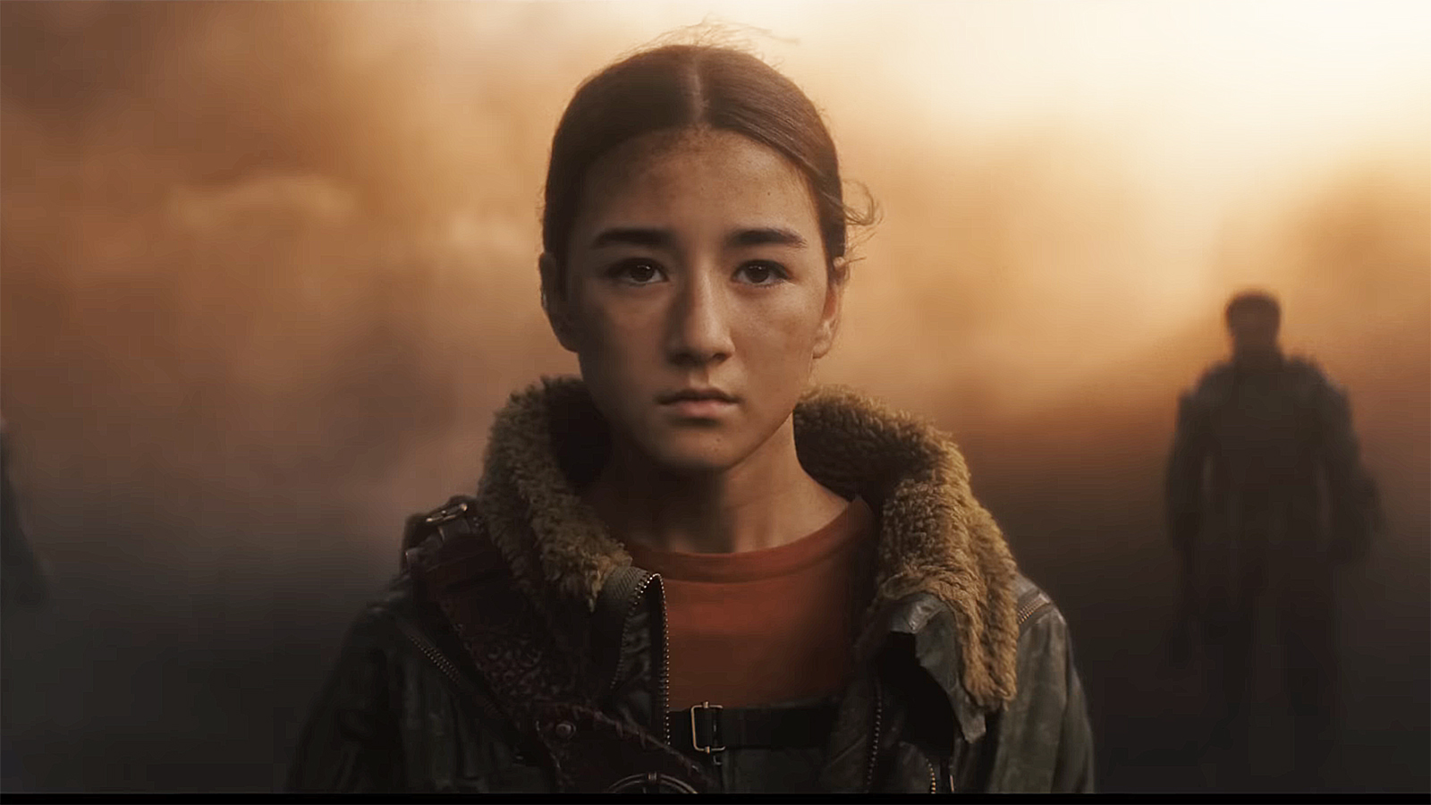 Ruthye standing in a place covered in dust in Supergirl