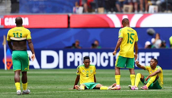 Thalente Mbatha and his South Africa teammate look dejected after the match as South Africa are eliminated from the World Cup. — Reuters/Archive