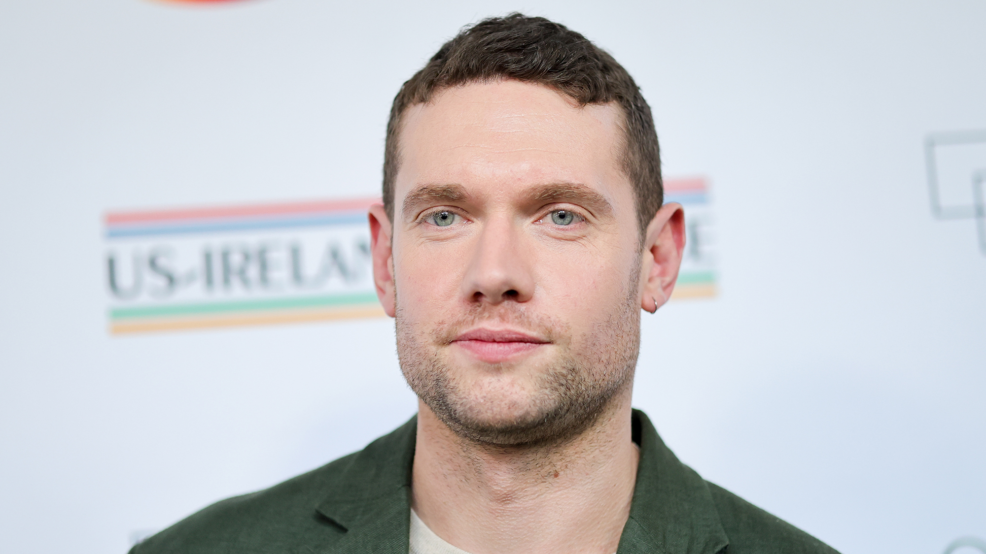 Tom Brittney posing for photographs at an event