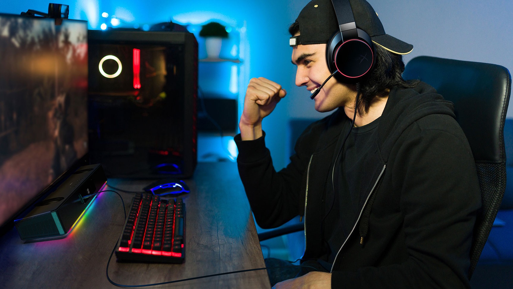 Lifestyle photography of a gamer using Creative Sound Blaster Katana V2X
