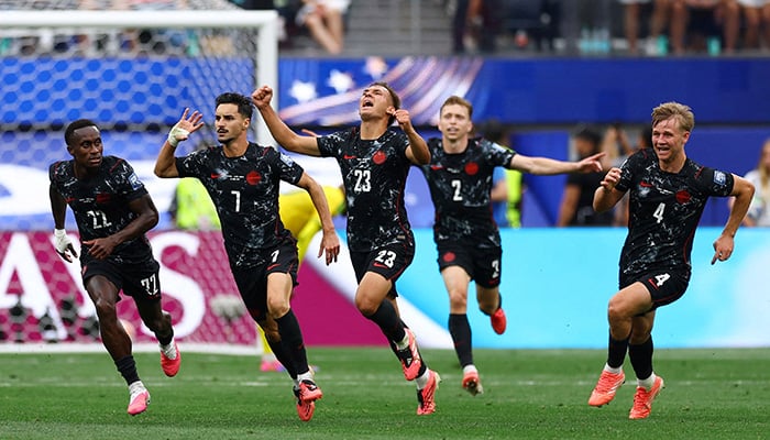 Canada's Stephen Eustaquio celebrates his first goal with his teammates. — Reuters/Archive