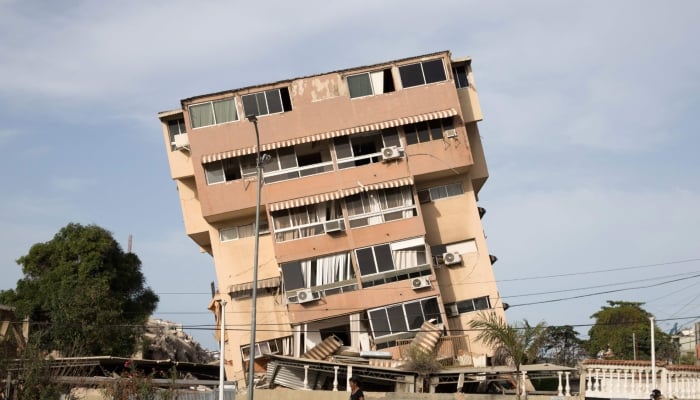 Image of a leaning building taken after two earthquakes in Caraballeda, La Guaira state, about 40 km northeast of Caracas, on June 25, 2026. — AFP