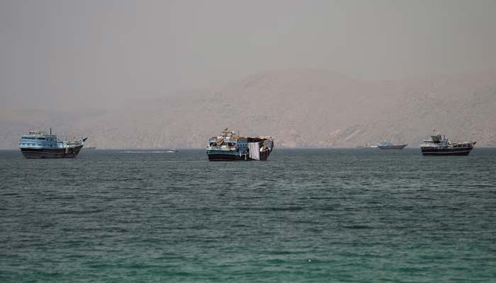 Ships in the Strait of Hormuz, seen from Musandam, Oman, June 22, 2026. – Reuters