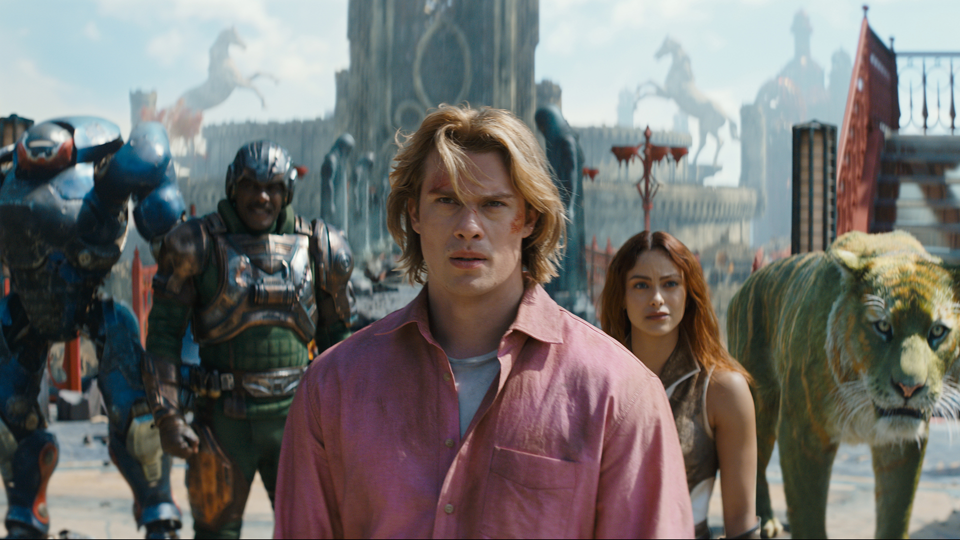 A close-up of Adam/He-Man flanked by Roboto, Man at Arms, Teela, and Cringer in Amazon's 2026 film adaptation of Masters of the Universe.
