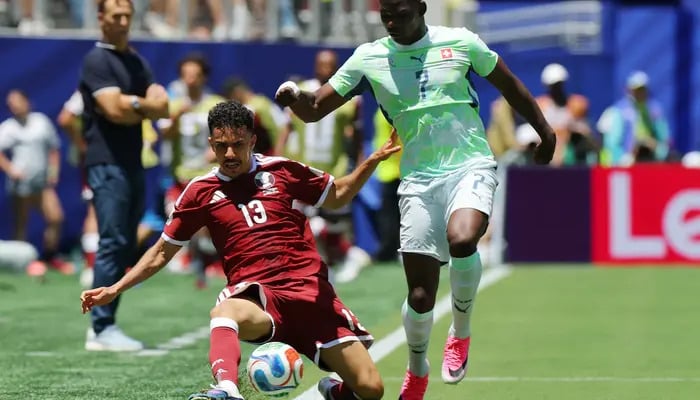 Ayoub Aloui of Qatar in action with Breel Embolo of Switzerland at San Francisco Bay Area Stadium, Santa Clara, California, USA, June 13, 2026. – Reuters