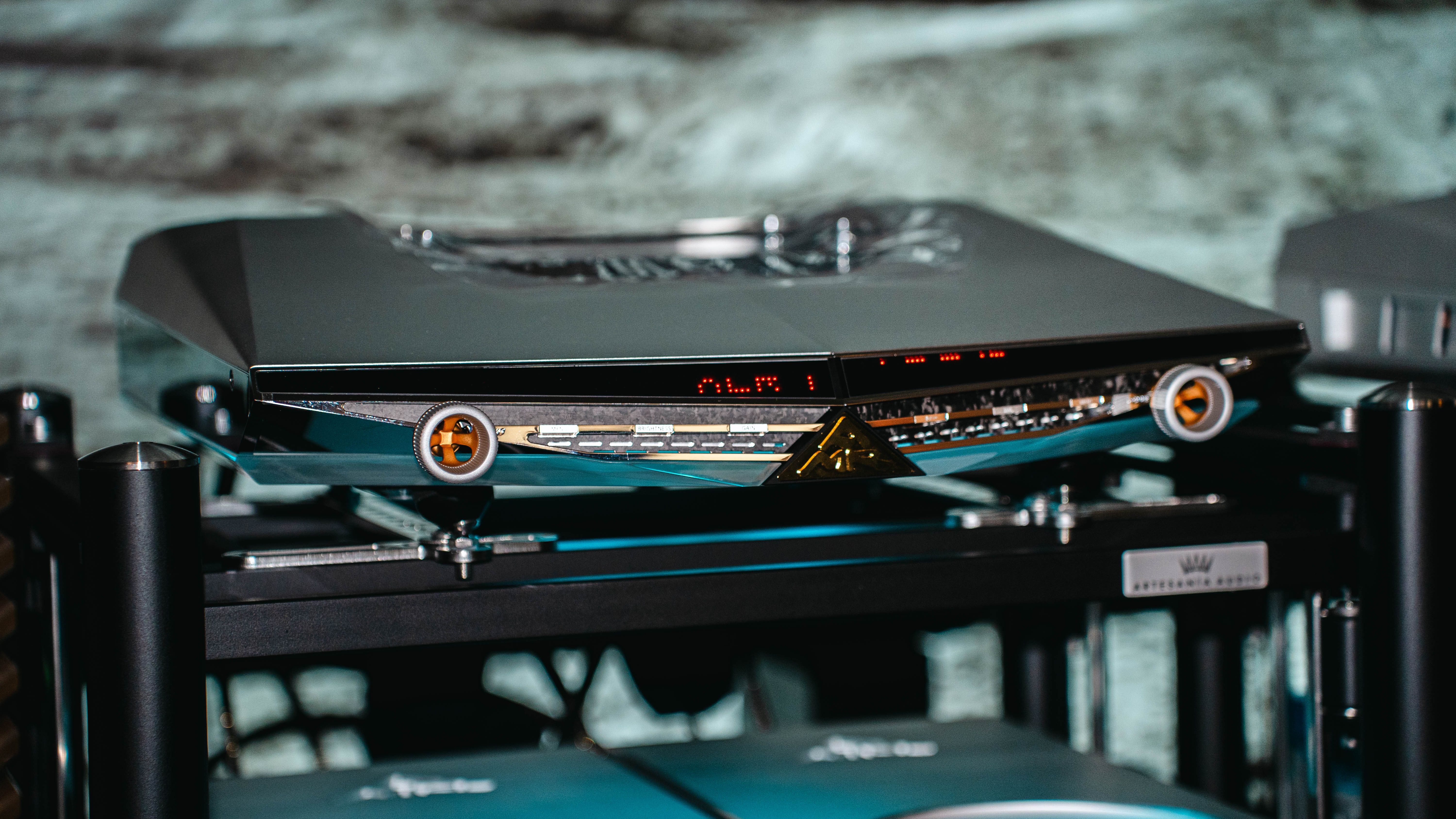 AMR Luna series separated in a hifi rack, with gray background