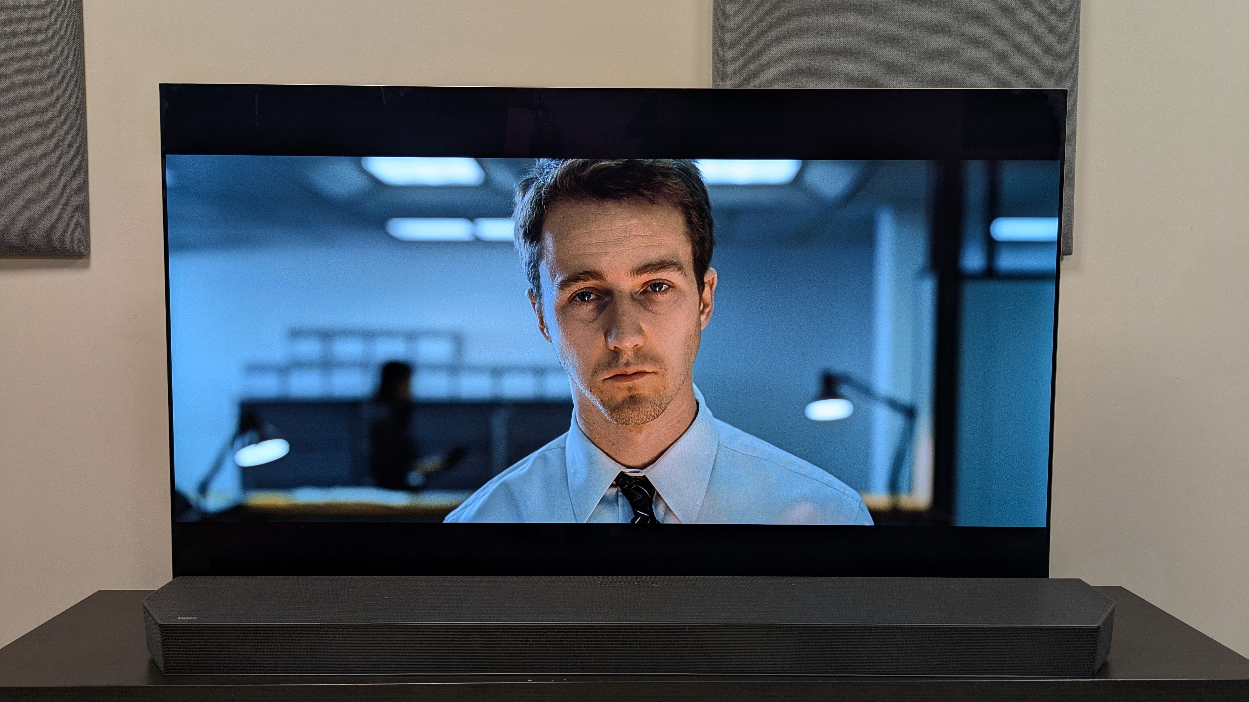 A close-up shot of the narrator from the Fight Club 4K Blu-ray on LG G5 OLED. The skin tones appear realistic and there is strong contrast and shadows on the narrator's face.