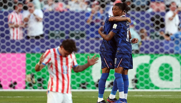 Frances Michael Olise and Kylian Mbappé celebrate after the match. – Reuters