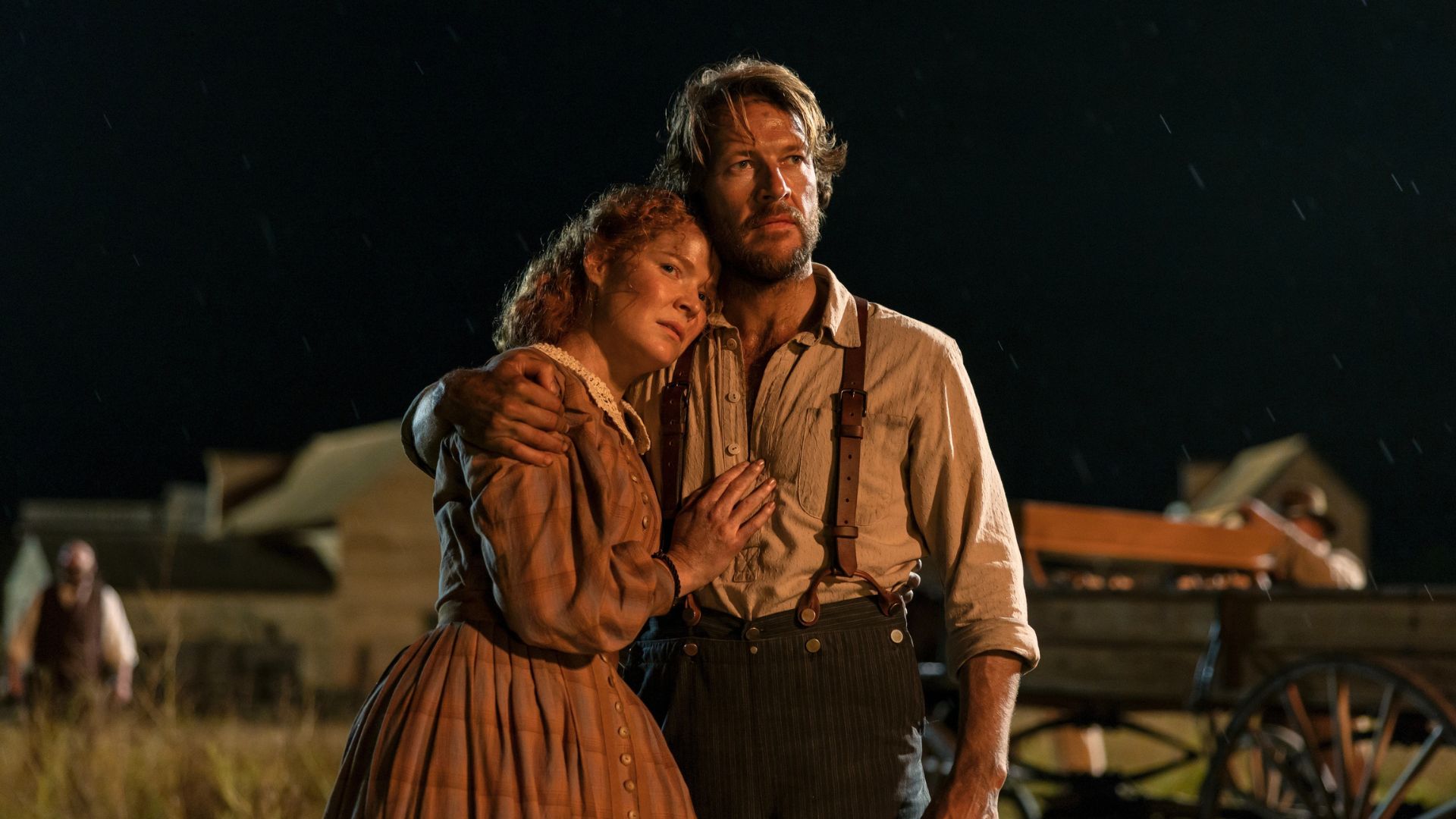 Caroline and Charles hug each other