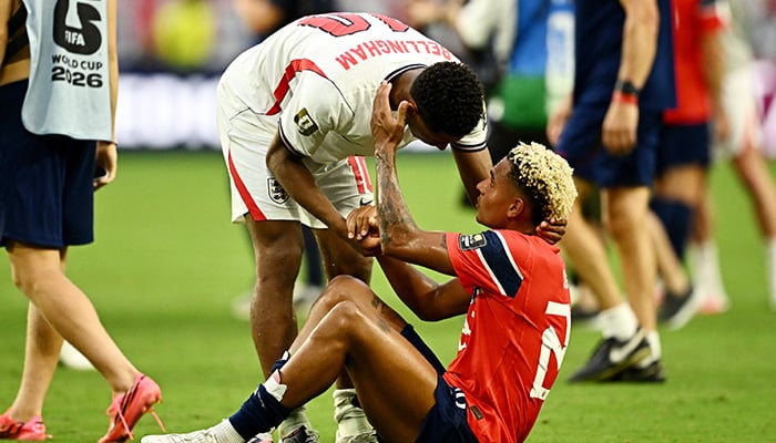 England's Jude Bellingham consoles Norway's Antonio Nusa after England's victory in the World Cup quarterfinals at Miami Stadium in Miami Gardens, Florida, on July 11, 2026, securing a place in the semifinals. – Reuters
