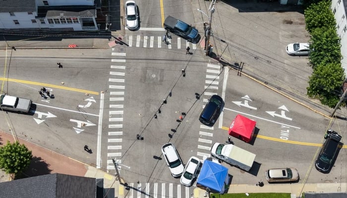 A drone view shows the cordoned off area at the scene of a shooting involving US Immigration and Customs Enforcement (ICE) in Biddeford, Maine, US, on July 13, 2026. – Reuters
