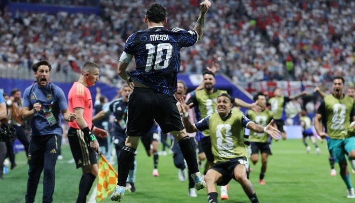 Argentine forward #10 Lionel Messi celebrates after winning the semi-final of the 2026 World Cup soccer tournament between England and Argentina at Atlanta Stadium in Atlanta on July 15, 2026. – AFP