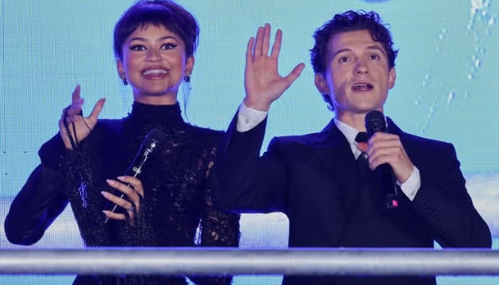 Tom Holland can't take his eyes off Zendaya at 'Spider-Man' event