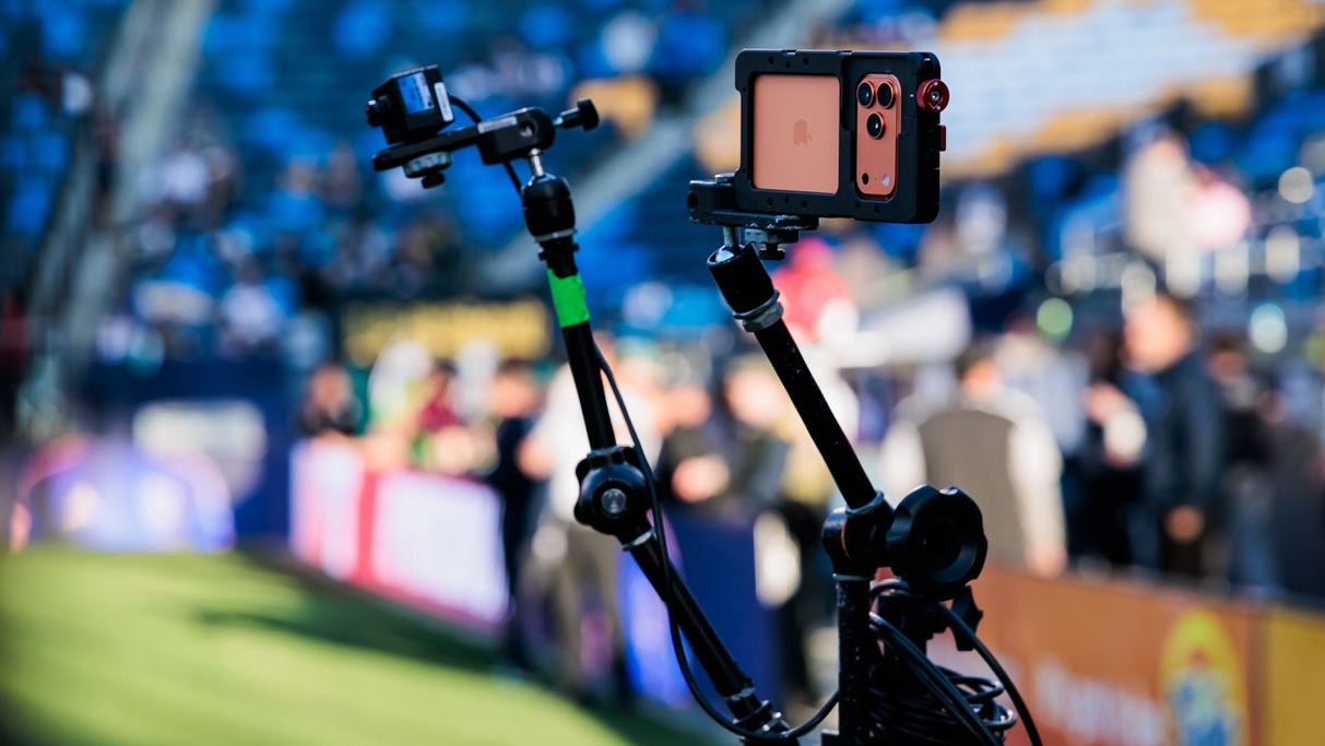 iPhone 17 Pro Max at an MLS match for Apple TV streaming