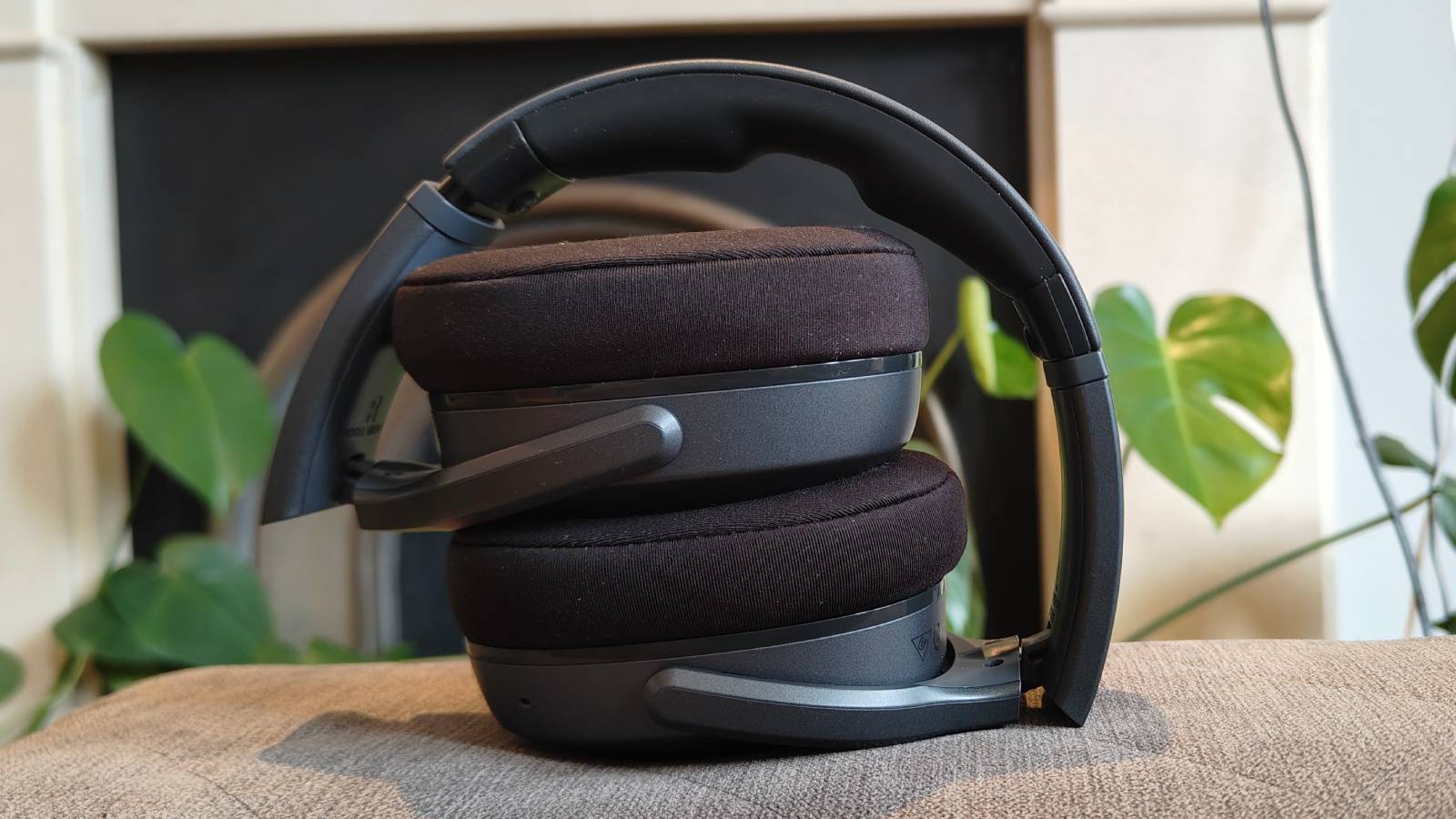 The Skullcandy Crusher 540 Active on a couch.