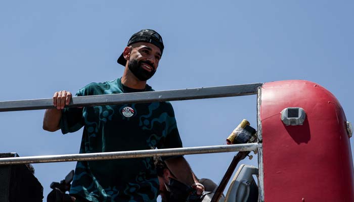 Egyptian Mohamed Salah looks at the crowd from a bus as the Egypt national team is greeted by fans at El Alamein International Airport upon their return from the 2026 FIFA World Cup, ahead of an official reception by President Abdel Fattah al-Sisi, in El Dabaa, Egypt, July 10, 2026. – Reuters